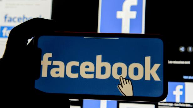 FILE PHOTO: The Facebook logo is displayed on a mobile phone