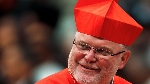FILE PHOTO: New cardinal Marx of Germany leaves after receiving the red biretta from Pope Benedict XVI during the Consistory ceremony in Saint Peter's Basilica at the Vatican