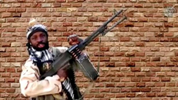 FILE PHOTO: Boko Haram leader Abubakar Shekau holds a weapon in an unknown location in Nigeria