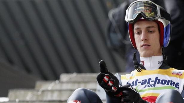 Gregor Schlierenzauer of Austria prepares prior to training jump for the third event of the 61st four-hills ski jumping tournament in Innsbruck, January 3, 2013. REUTERS/ Dominic Ebenbichler (AUSTRIA - Tags: SPORT SKIING)