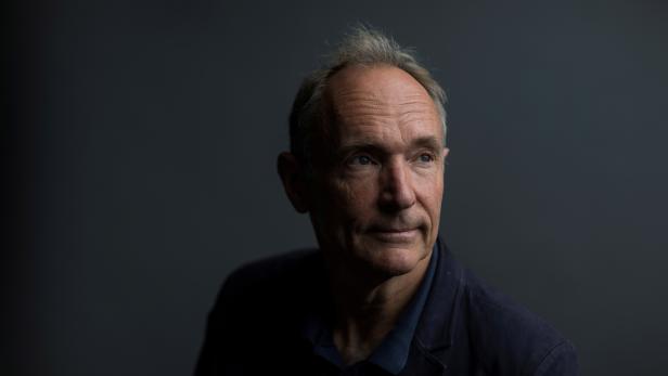 FILE PHOTO: World Wide Web founder Tim Berners-Lee poses for a photograph following a speech at the Mozilla Festival 2018 in London