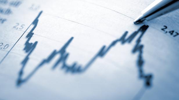 Finance chart with high peak on document