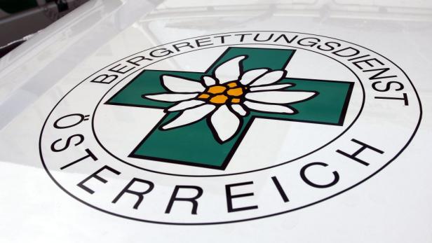 Das Logo des Bergrettungsdienstes Österreich mit Edelweiß.