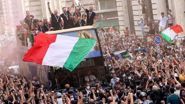 The Italy team drive through Rome on a open top bus tour after they won Euro 2020