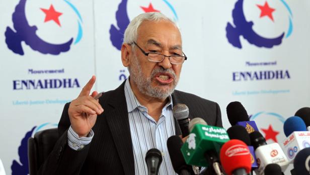 epa03693074 Tunisian leader of the Islamist Ennahda party, Rached Ghannouchi, speaks during press conference in Tunis, Tunisia, 09 May 2013. Ghannouchi said Tunisia is in war against armed groups, referring to Tunisian troopsí ongoing operation against radical Islamists along the country&#039;s border with Algeria. Tunisian security forces on 09 May arrested 39 suspects in connection with a series of attacks. In the most recent attack, two soldiers were wounded in a landmine attack on 06 May. EPA/MOHAMED MESSARA