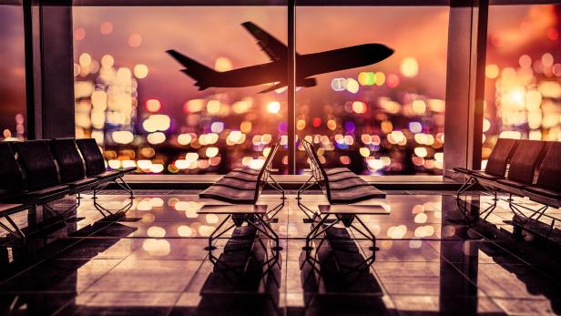Airport Lounge and airplane take off in the city