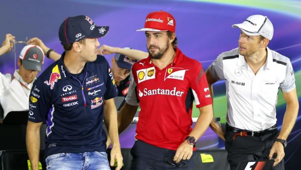 Sollte Alonso (Mitte) zu McLaren wechseln, wäre dort für Button (rechts) vermutlich kein Platz mehr. Vettel (links) könnte dafür seinen Transfer zu Ferrari endlich öffentlich machen.