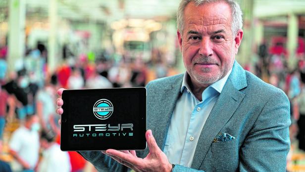 Wolf mit dem neuen Logo Steyr Automotive