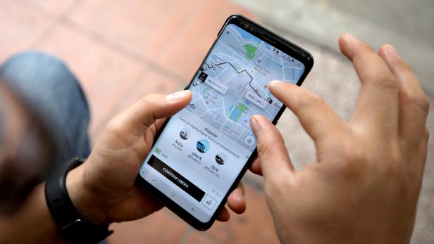 Uber sells Southeast Asia business to Grab Uber sells Southeast Asia business to Grab