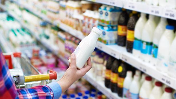 Woman shopping dairy product in store