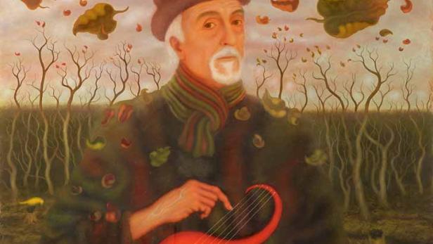 Ein Mann mit Bart hält ein rotes Instrument in einer surrealen Herbstlandschaft.