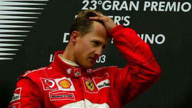 FILE PHOTO: Ferrari's Michael Schumacher is overcome with emotion on the winners podium after claiming victory in the San Marino Grand Prix at Imola just hours after his mother Elisabeth, who was in a coma, died in Cologne. FILE PHOTO: Ferrari's Michael Schumacher is overcome with emotion on the winners podium after claiming victory in the San Marino Grand Prix at Imola just hours after his mother Elisabeth, who was in a coma, died in Cologne.