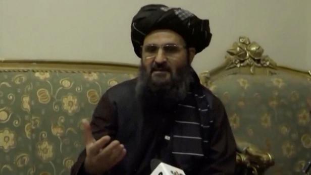 Afghanistan's acting deputy prime minister Baradar speaks during an interview in Kandahar