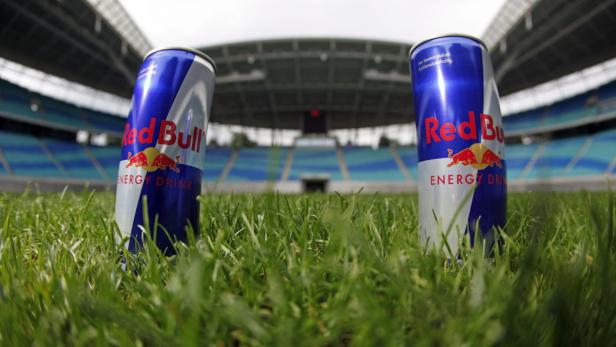 epa02229537 (FILE) A file picture dated 23 June 2010 shows two Red Bull cans placed on the green of the Central Stadium in Leipzig, Germany. Austrian beverage manufacturer Red Bull has secured the naming rights to the stadium until the year 2040. From 01 July 2010 on, the World Cup site of 2006 is called Red Bull Arena. &#039;We view this as a long-term project&#039;, said Dieter Gudel, general manager of the soccer club RB Leipzig on 29 June 2010. The christening of the newly-named stadium will take place on 24 July 2010 at a game versus FC Schalke 04. EPA/JAN WOITAS