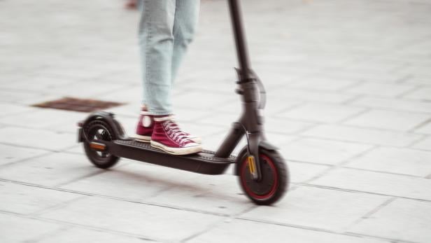 blurred motion of a push scooter