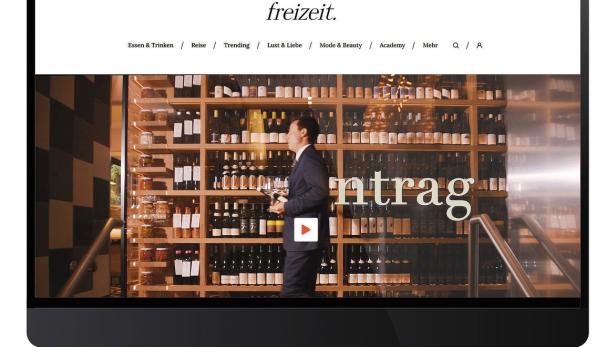 Ein Bildschirm zeigt die Webseite freizeit.de mit einem Video über Wein.