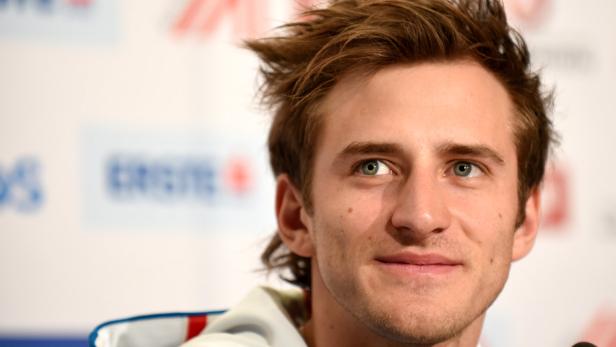 Nahaufnahme eines Mannes mit hellbraunen Haaren und hellen Augen.