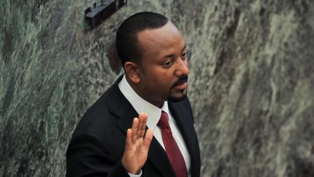 FILE PHOTO: Ethiopia's Prime Minister Abiy Ahmed takes oath during his incumbent ceremony at the Parliament building in Addis Ababa