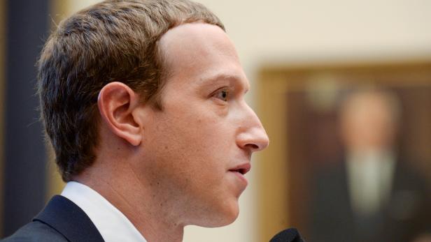 FILE PHOTO: FILE PHOTO: Facebook Chairman and CEO Zuckerberg testifies at a House Financial Services Committee hearing in Washington