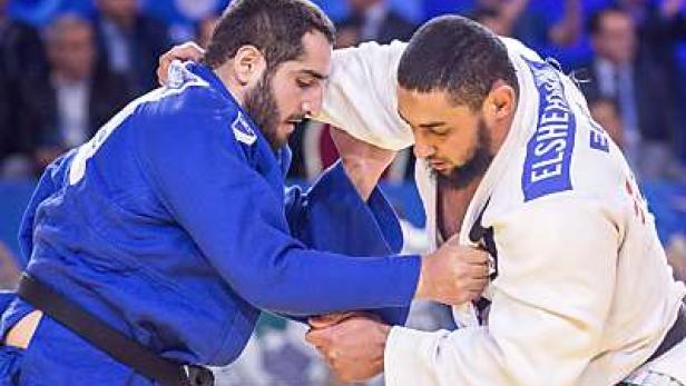 Islam El Shehaby (weiß) ließ grundlegende Verhaltensregeln vermissen Ägyptischer Judoka nach Handshake-Verweigerung heimgeschickt