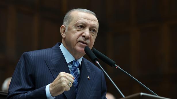 Turkish President Tayyip Erdogan addresses members of parliament from his ruling AK Party in Ankara