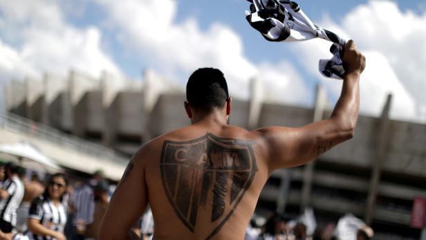 FILE PHOTO: Atletico Mineiro fans outside the stadium before a match against Fluminense