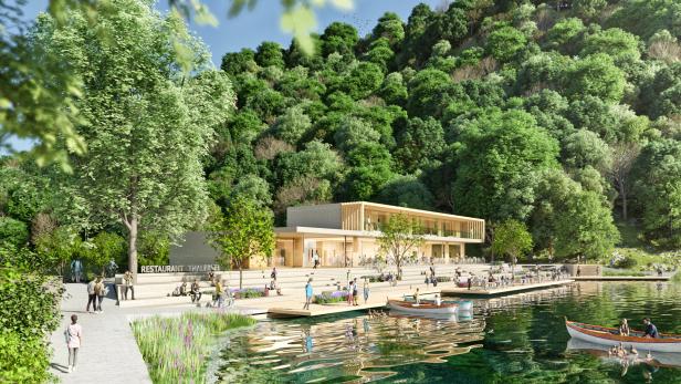 Das Restaurant Thalersee liegt an einem Seeufer mit vielen Menschen.