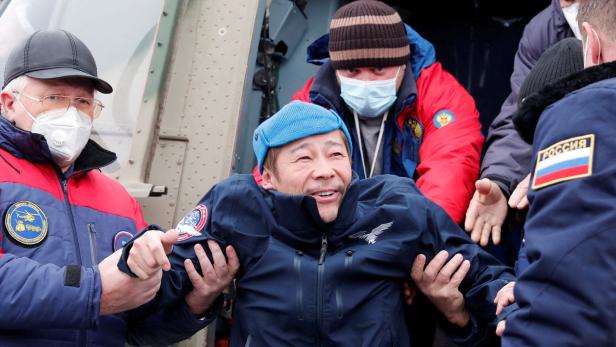 Japanische Weltraumtouristen nach zehn Tagen zurück auf der Erde