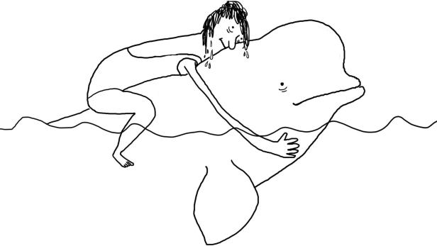 Eine Frau im Badeanzug umarmt einen Belugawal im Wasser.