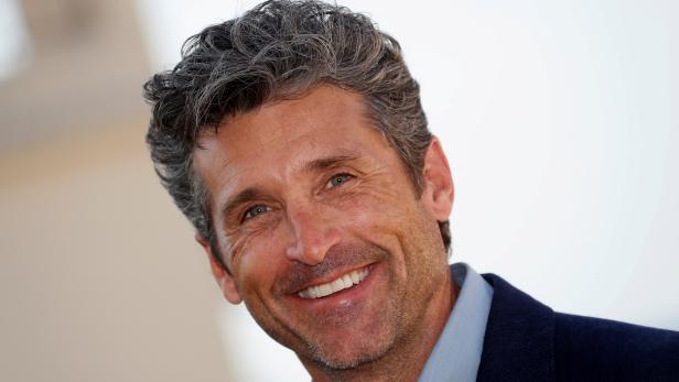 FILE PHOTO: Actor Patrick Dempsey poses during a photocall for the television series "Devils" during the annual MIPCOM television programme market in Cannes