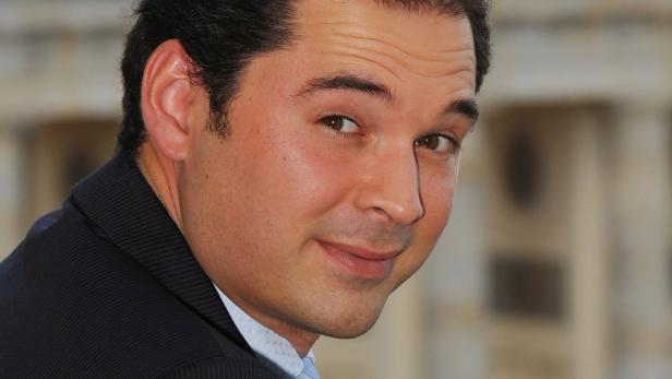 epa02319437 Ossetian maestro Tugan Sokhiev smiles during a press conference in Berlin, Germany, 06 September 2010. Sokhiev is to be the principal conductor of German Symphonic Orchestra (DSO) from the 2012/13 season on. With immediate effect, Sokhiev is the Music Director Designate. EPA/JENS KALAENE