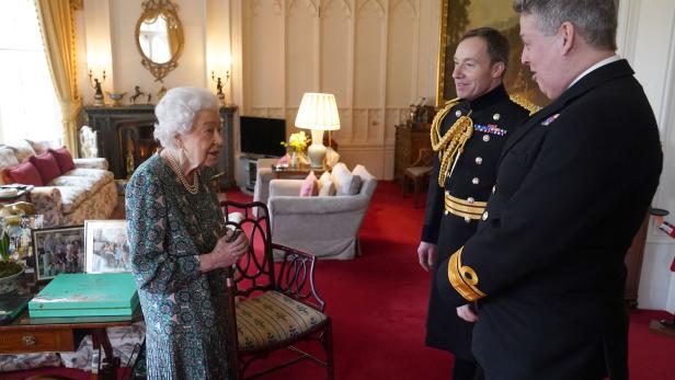 Britain's Queen Elizabeth meets the incoming and outgoing Defence Service Secretaries at Windsor Castle