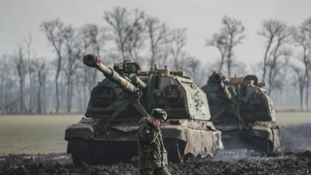 Russian armoured vehicles stand on the road in Rostov region