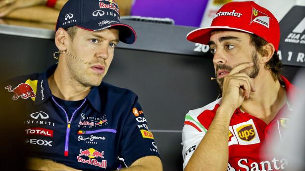 Fernando Alonso (re.) geht, Sebastian Vettel kommt.