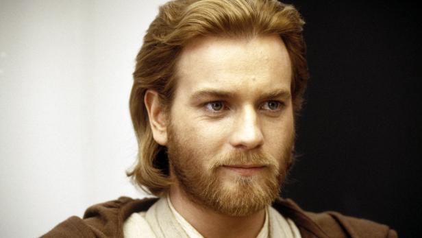 Porträt von Ewan McGregor mit blonden Haaren und Bart.