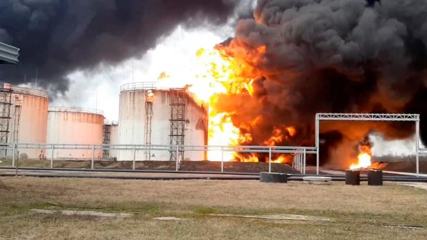 Oil depot burns after alleged airstrike in the city of Belgorod, Russia