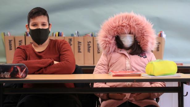 School resumes with open windows and protective masks against spread of coronavirus disease in Bonn