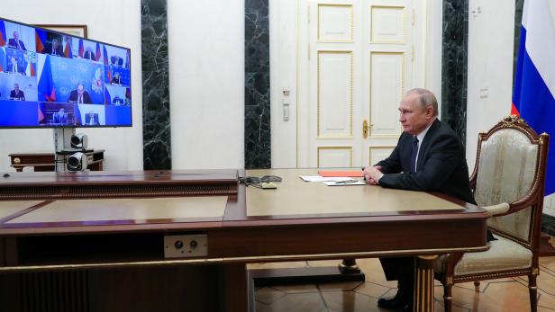 Russian President Putin chairs a video conference meeting with Security Council members 