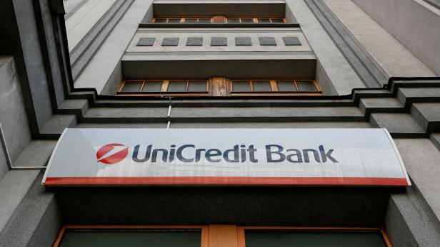 FILE PHOTO: A UniCredit sign at one of the bank's branches in Kiev