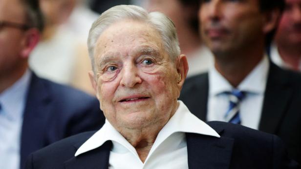 FILE PHOTO: Billionaire investor George Soros is awarded the Schumpeter Prize, an Austrian award for achievement in economics and politics, in Vienna, where the Central European University he funds is opening a new campus after being forced out of his nati