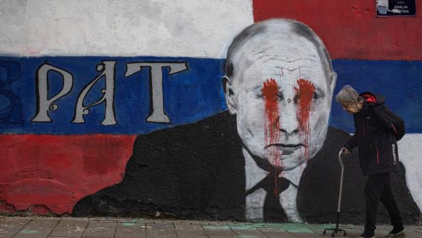 Mural of Russian President Vladimir Putin is vandalised, in Belgrade