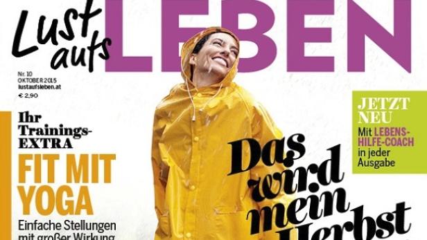 Eine lächelnde Frau in einem gelben Regenmantel auf dem Cover der Zeitschrift „Lust aufs Leben“.