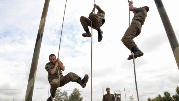 Peschmerga-Kämpfer trainieren in Arbil. Nun werden sie auch von türkischen Soldaten ausgebildet.