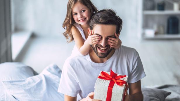 Dad with daughter at home