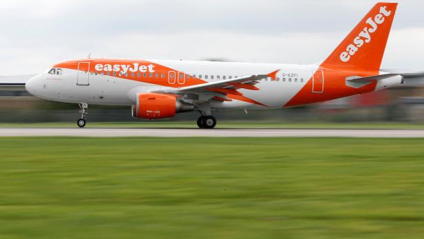 FILE PHOTO: An Easyjet Airbus aircraft takes off from the southern runway at Gatwick Airport in Crawley