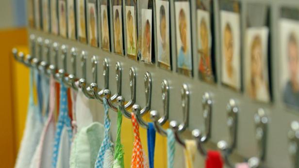 hooks with towels of nursery children