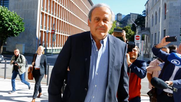 Former soccer officials Sepp Blatter and Michel Platini face corruption charges in Swiss trial