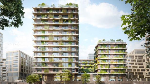 Ein Wohnkomplex mit viel Grün an den Fassaden und auf den Dächern.