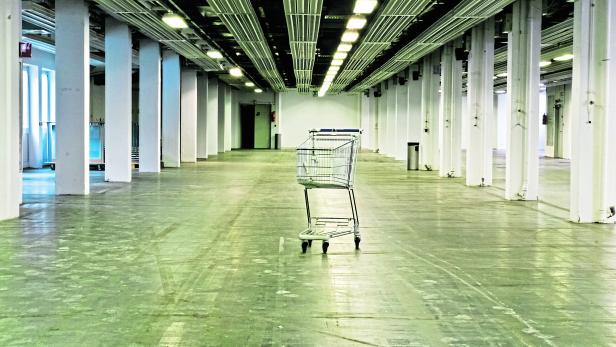 Empty Abandoned Warehouse with Shopping Cart
