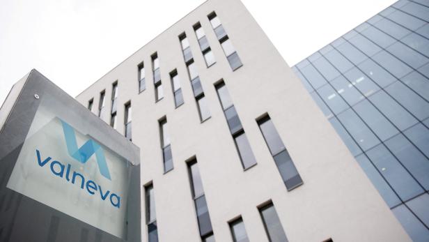 FILE PHOTO: The logo of French-Austrian biotech firm Valneva is seen outside their headquarters in Vienna
